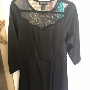 Little black dress with scalloped neckline